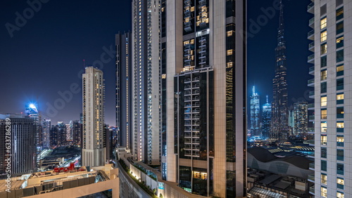 Photography Tallest skyscrapers in downtown dubai located on bouleward street near shopping mall aerial night timelapse