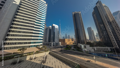 Aerial panoramic view to Dubai downtown and difc skyscrapers timelapse.