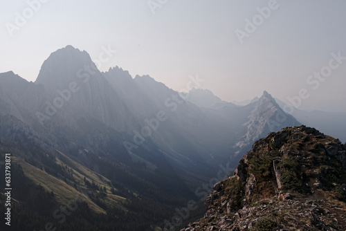 Views of mountains and forests on a summers day in Kananaskis Country, Alberta, Canada from on top of King Creek Ridge