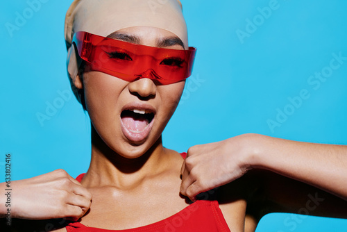 Woman red blue smiling beauty sunglasses portrait