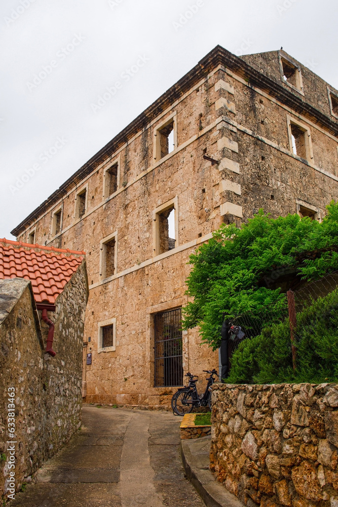 The 'House Within a House', or Kuca U Kuci, in Bol, Brac Island in Croatia. This shows the outer house. In the 19th century, a newer house was built around an existing house which was never demolished