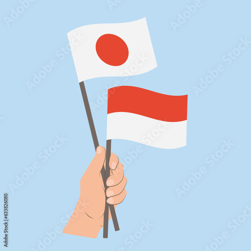 Flags of Japan and Indonesia, Hand Holding flags