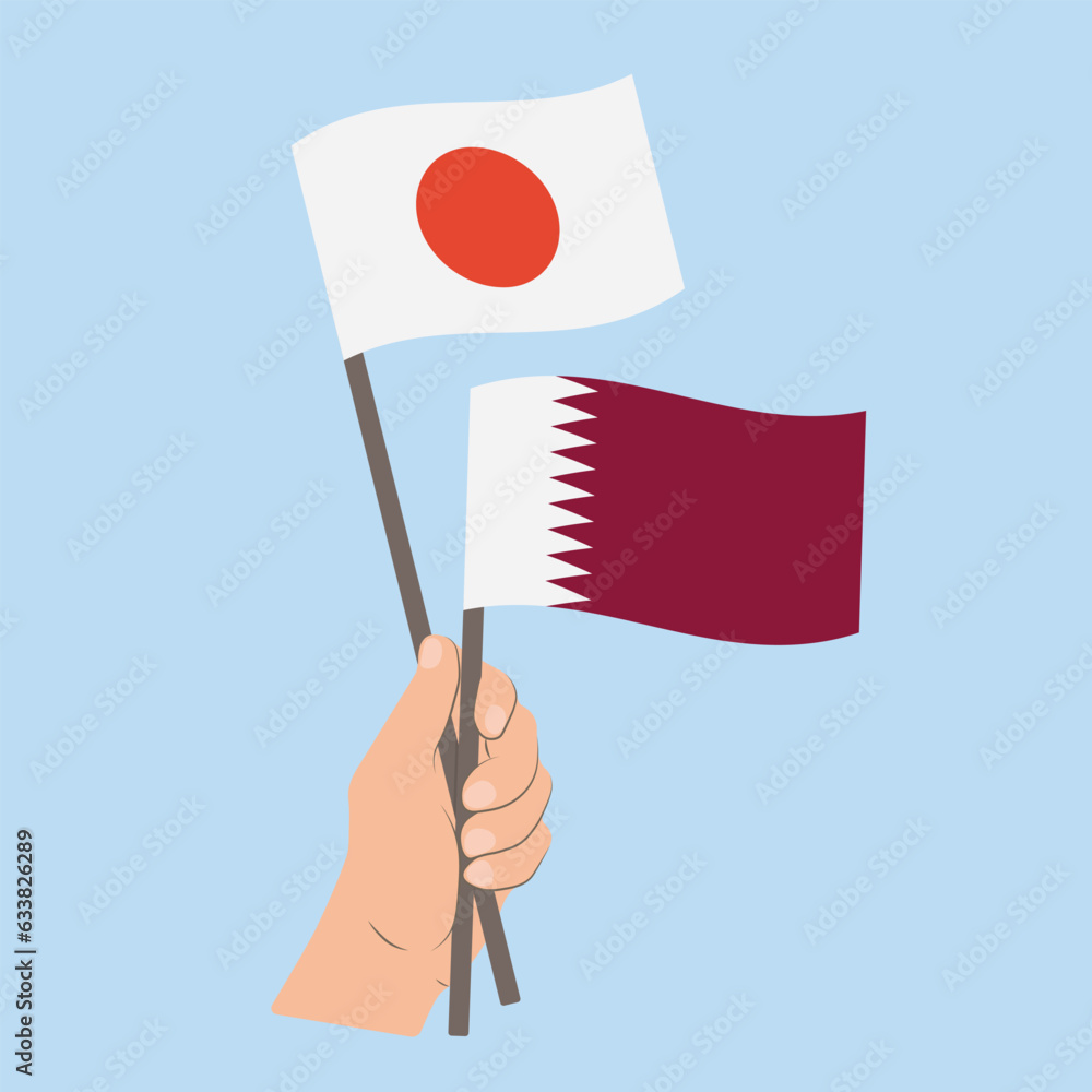 Flags of Japan and Qatar, Hand Holding flags Flags of Japan and Qatar, Hand Holding flags