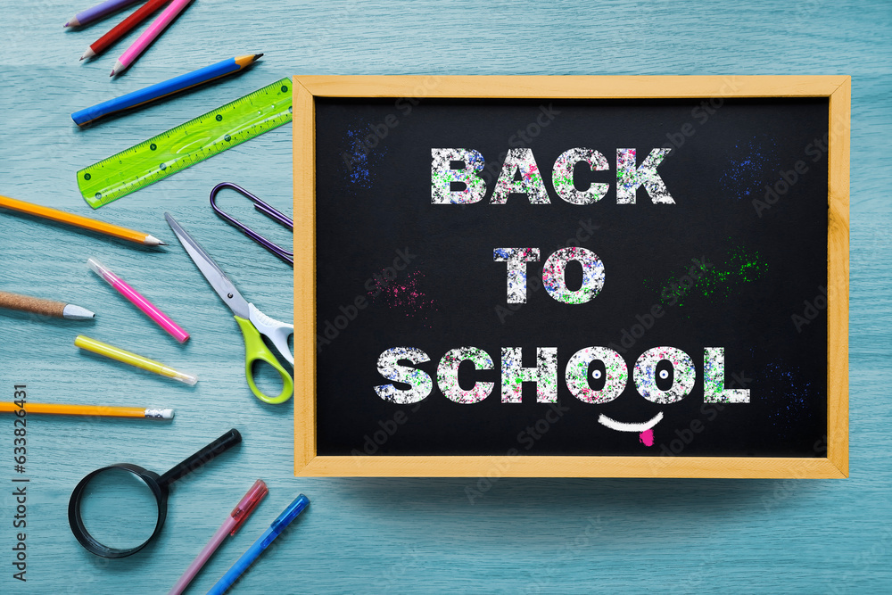Back to School. Chalk writing on blackboard. The concept of beginning