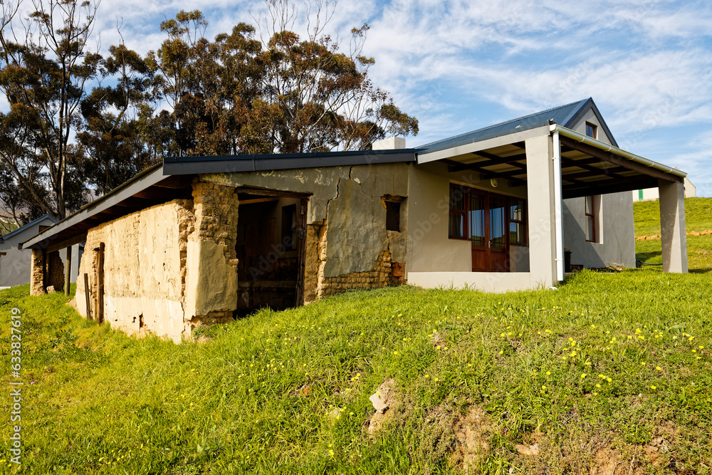 A modern farmhouse connected to a very old, dilapidated building on a farm near Caledon, Western Cape, South Africa. A modern farmhouse connected to a very old, dilapidated building on a farm near Caledon, Western Cape, South Africa.