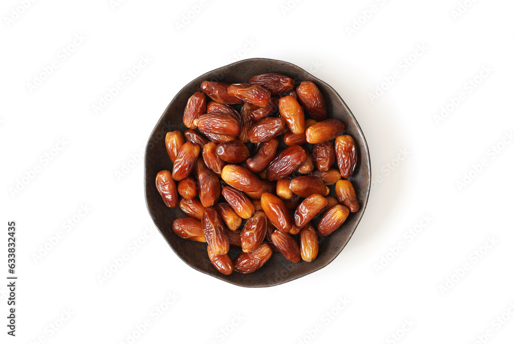 Dried dates in a plate isolated on white background. Traditional Arabic food. Top view, flat lay. Dried dates in a plate isolated on white background. Traditional Arabic food. Top view, flat lay.