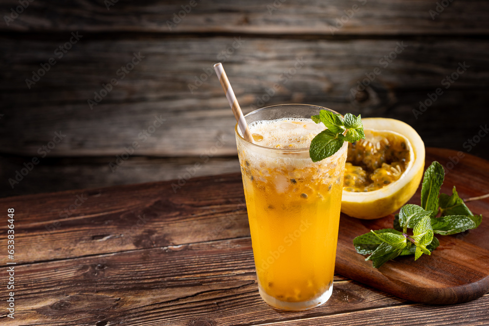 Fototapeta premium Refreshing passion fruit drink with mint and vodka.