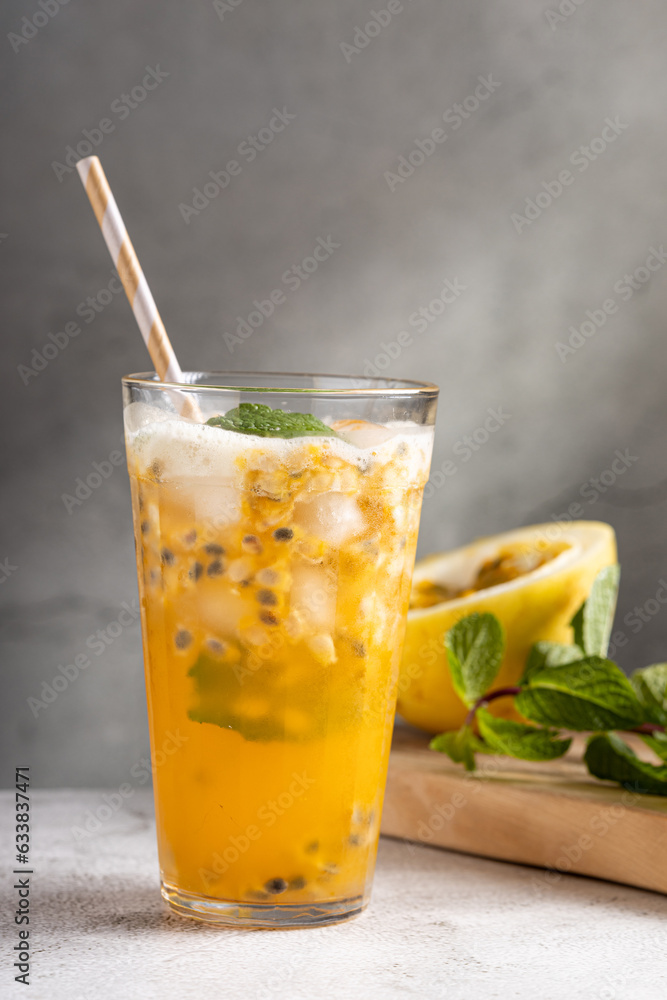 Refreshing passion fruit drink with mint and vodka. Refreshing passion fruit drink with mint and vodka.