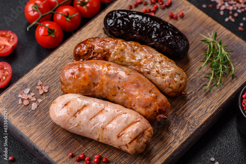 Delicious juicy sausages of several varieties grilled with salt, spices and herbs