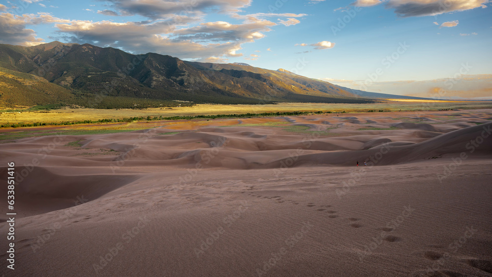 desert with cloudy sky during sunset desert with cloudy sky during sunset