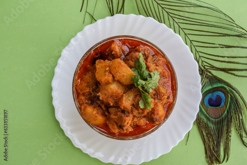 Delicious Spicy Potato curry side dish known as Aloo ki sabji, Indian side dish bowl photo