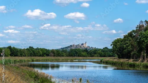 Views over the Elbe to Velke Nemcice Castle under a cloudy sky © Margitta