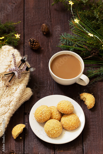 Obraz na płótnie Christmas nut cookies Filbertines served with coffee on a background of Christmas decorations. w salonie