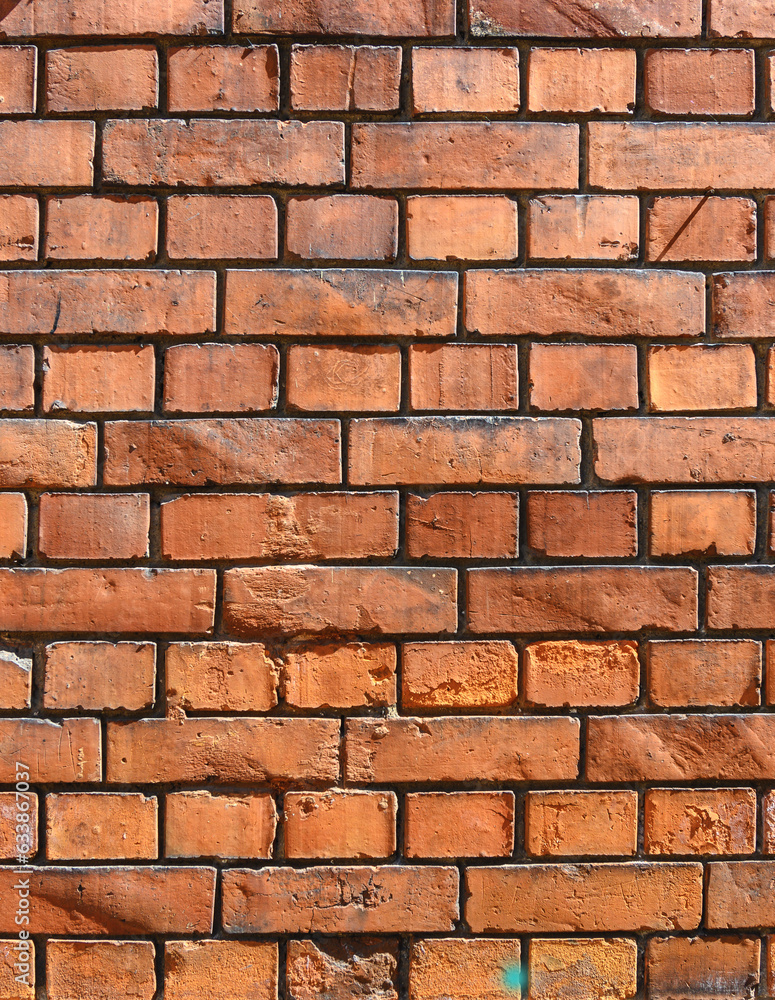 Fototapeta premium red brick wall in the historical part of the old city in europe as a background 7