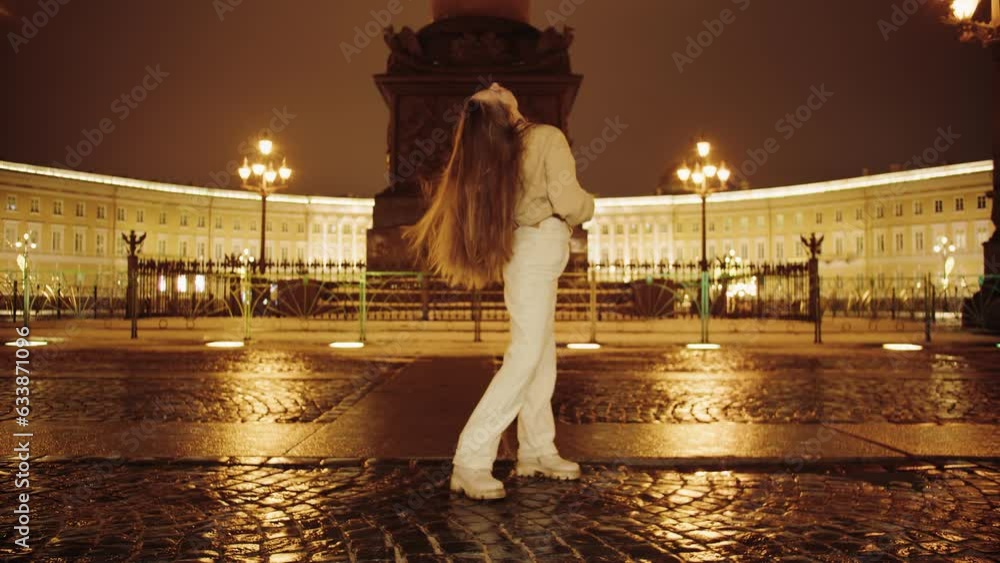 Pretty beautiful caucasian girl with long brown hair, a beige sweater ...