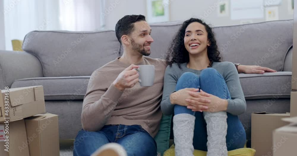 Couple, coffee and new house on floor, talk or relax together in lounge for thinking, idea or fresh start. Man, woman and moving with tea cup, boxes or cardboard package with chat in home living room Couple, coffee and new house on floor, talk or relax together in lounge for thinking, idea or fresh start. Man, woman and moving with tea cup, boxes or cardboard package with chat in home living room