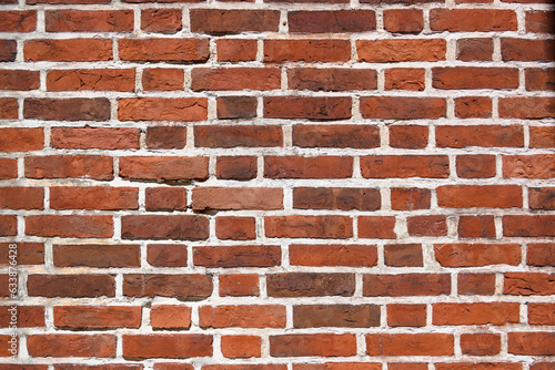 red brick wall in the historical part of the old city in europe as a background 17