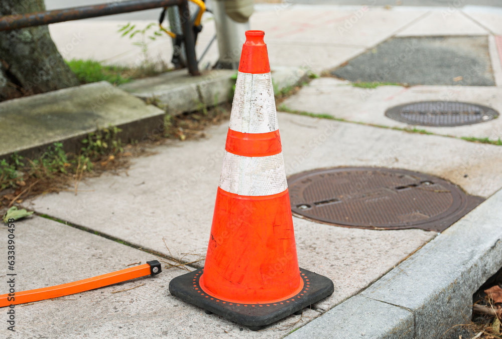 construction cones line streets, embodying urban evolution, progress