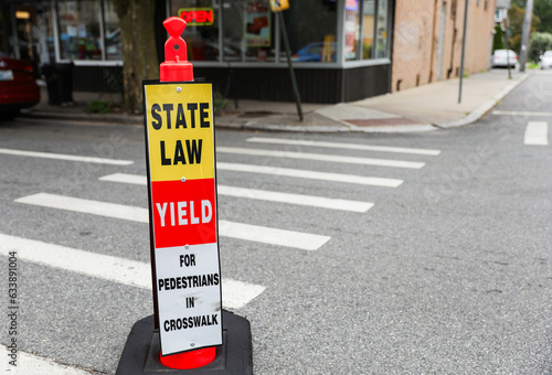  yellow pedestrian sign, a universal symbol of safety and shared space, embodies caution, pedestrian-friendly areas, and road awareness