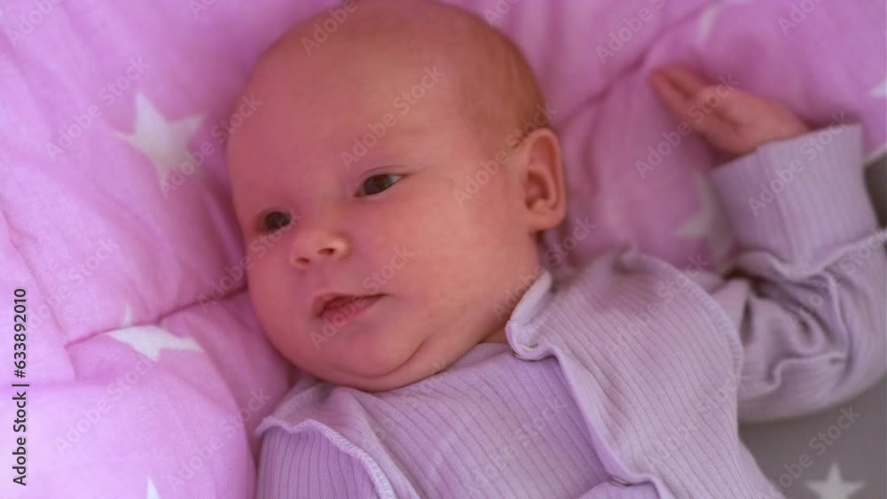 Little newborn baby in crib