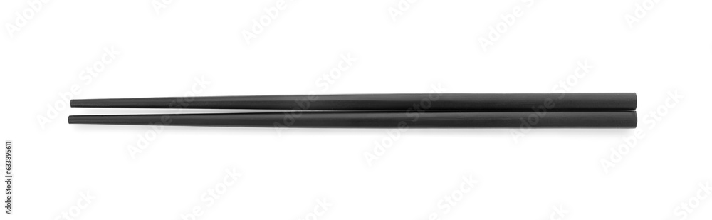 Pair of black chopsticks isolated on white, top view Pair of black chopsticks isolated on white, top view
