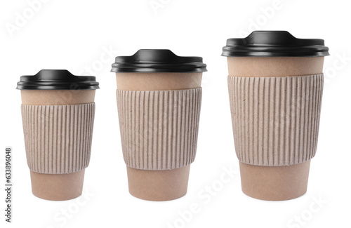 To-go drink. Set with three paper coffee cups of different sizes isolated on white