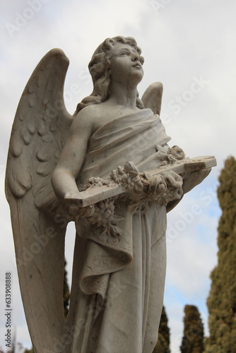 Angel Holding a Cross and Looking at Sky
