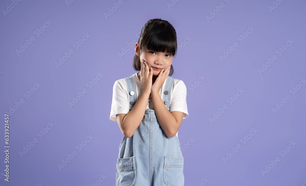 cute asian girl posing on purple background cute asian girl posing on purple background
