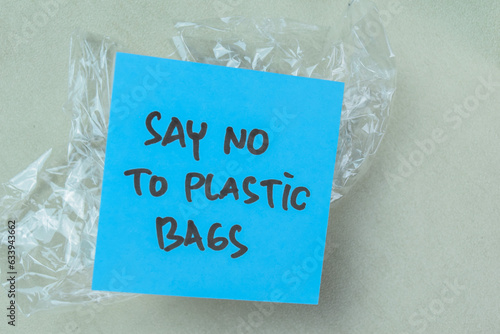 Tablou pe pânză Concept of Say No To Plastic write on book isolated on Wooden Table