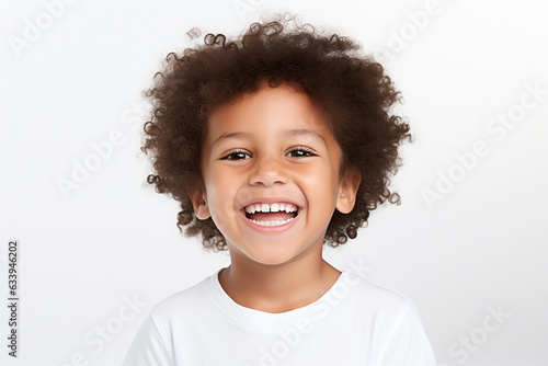 a professional portrait studio photo of a cute mixed race boy laughing and smiling. isolated on white background, ads and web design