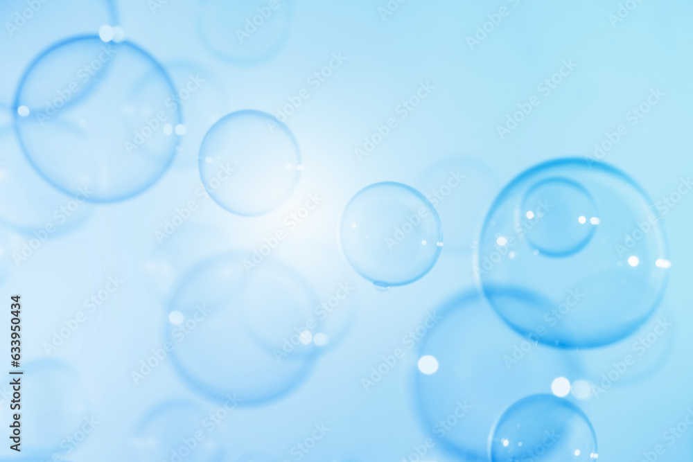 Refreshing of Soap suds, Bubbles Water. Beautiful Transparent Blue Soap Bubbles Floating in The Air. Abstract Blurred Background, Blue Textured, Celebration Festive Backdrop. Refreshing of Soap suds, Bubbles Water. Beautiful Transparent Blue Soap Bubbles Floating in The Air. Abstract Blurred Background, Blue Textured, Celebration Festive Backdrop.