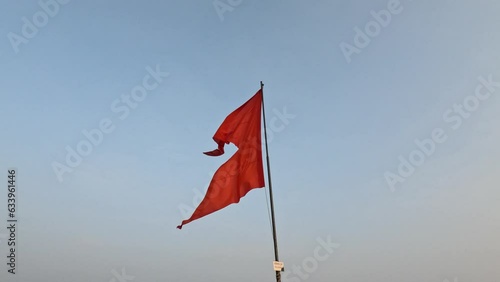 Saffron flag waving or fluttering repersenting Hindu culture photo