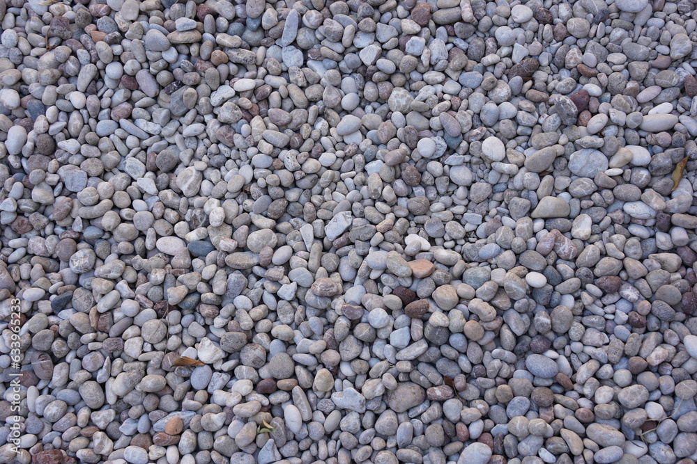 Abstract different shapes pebbles sea texture background Abstract different shapes pebbles sea texture background