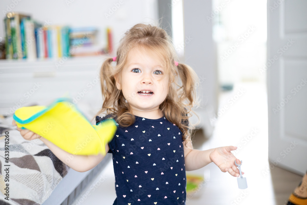 Fototapeta premium toddler girl, authentic home, child emotions