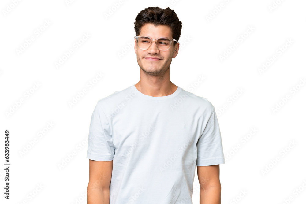Young caucasian handsome man over isolated background having doubts while looking side Young caucasian handsome man over isolated background having doubts while looking side