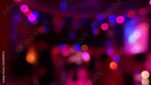 Defocused dancing scene in the night club photo