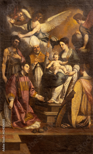 GENOVA, ITALY - MARCH 6, 2023: The painting of Madonna among the saints in th...