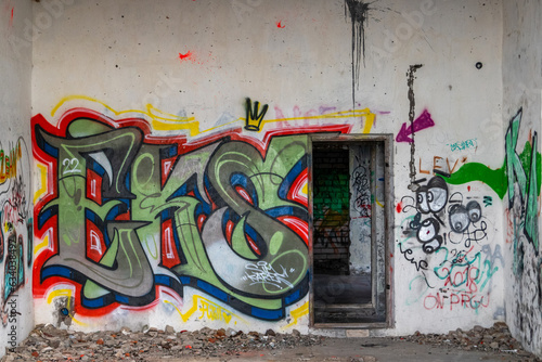 Inside abandoned soviet boarder guard building on the Estonian coastline, located in Parispea, Lahemaa national park, image shows the interior of the abandoned building and graffiti. August 2023  photo