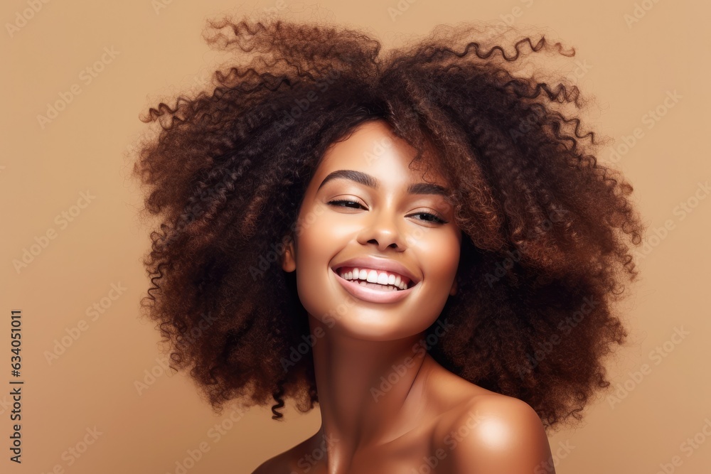 beautiful african american girl with wavy black hair, cosmetics and ...