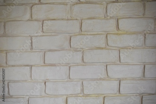 White gypsum for the background under the jointing of bricks wall brick