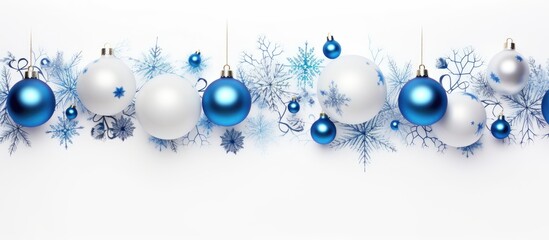 Blue ornaments on a Christmas border