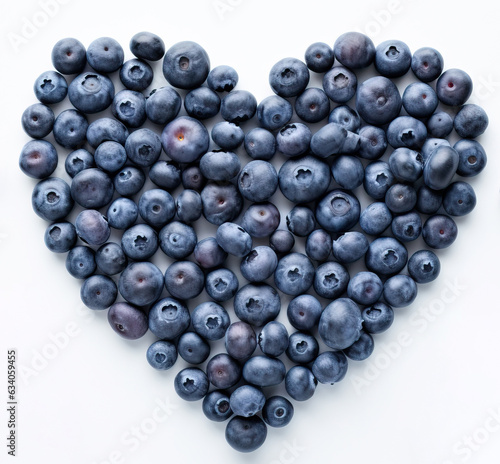 Fresh blueberries in the shape of a heart.
