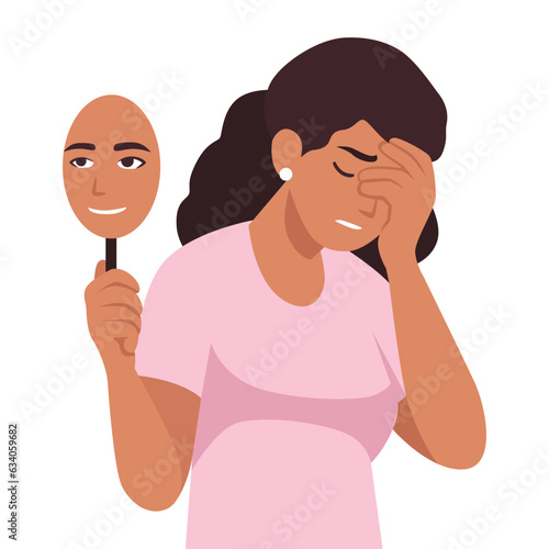 Sad woman is covering her face with a smiling mask. Concept good and bad mood.