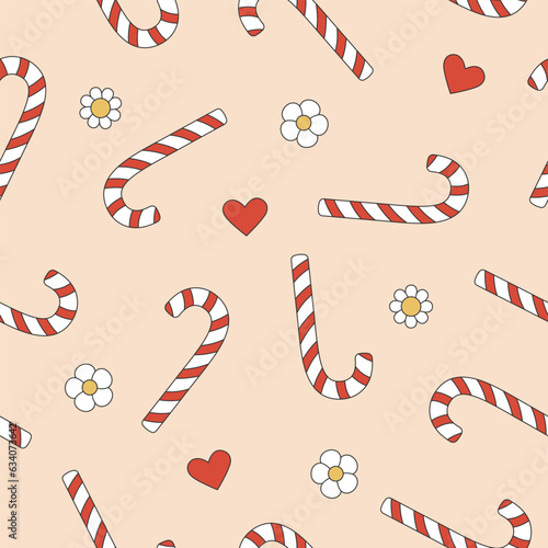 Christmas groovy seamless pattern with candy cane on pink background. Retro background for wrapping paper, invitation, greeting card, textile.