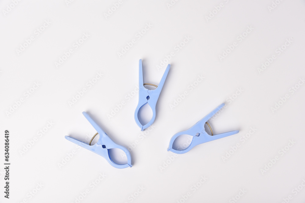 Clothespin clips on isolated white background Clothespin clips on isolated white background