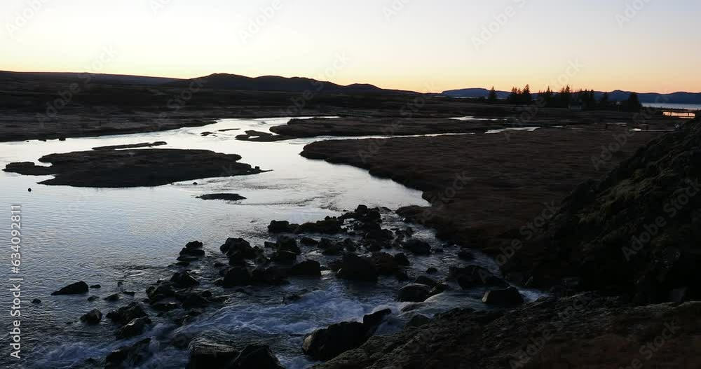 movie clip of a river in Iceland at sunrise flowing over rocks movie clip of a river in Iceland at sunrise flowing over rocks