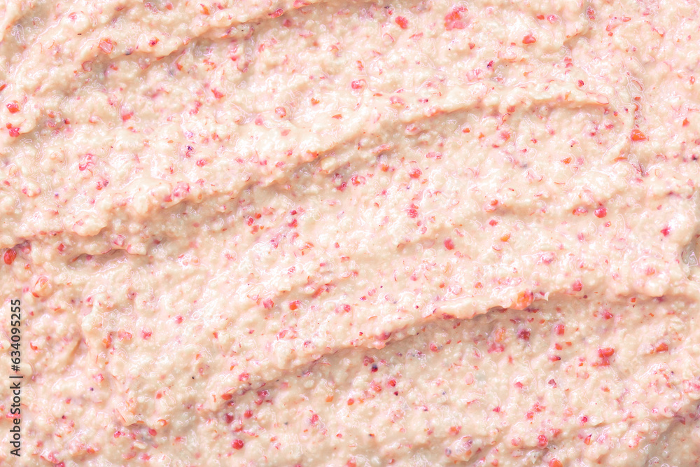 Creamy milk with pieces of fruit. Ice cream texture. Delicious sweet dessert close-up as a background. Creamy milk with pieces of fruit. Ice cream texture. Delicious sweet dessert close-up as a background.