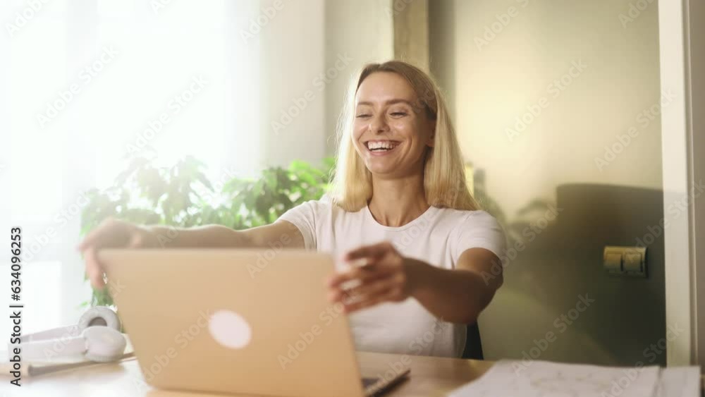 Positive tired young blond woman feels satisfied with distance remote work well done at light home Calm self employee female relax after hard working day finished project on laptop computer indoors Positive tired young blond woman feels satisfied with distance remote work well done at light home Calm self employee female relax after hard working day finished project on laptop computer indoors