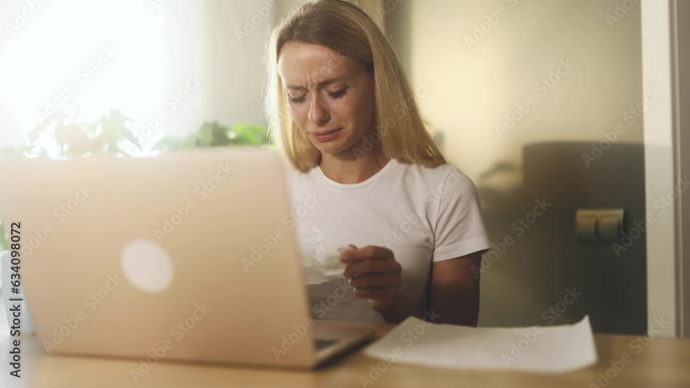 Sad crying woman talk with psychotherapist at online distance remote counselling session while got solution of problem indoors Depressed girl with psychological support by laptop computer at home Sad crying woman talk with psychotherapist at online distance remote counselling session while got solution of problem indoors Depressed girl with psychological support by laptop computer at home