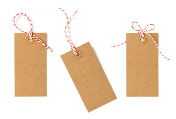 set / collection of three brown natural craft kraft paper hang tags, price tags or gift tags with striped red and white baker's twine, isolated design elements, different positions, PNG